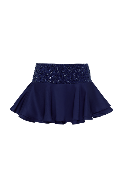 Falda pantalón azul marino con cintura de lentejuelas y falda de volantes