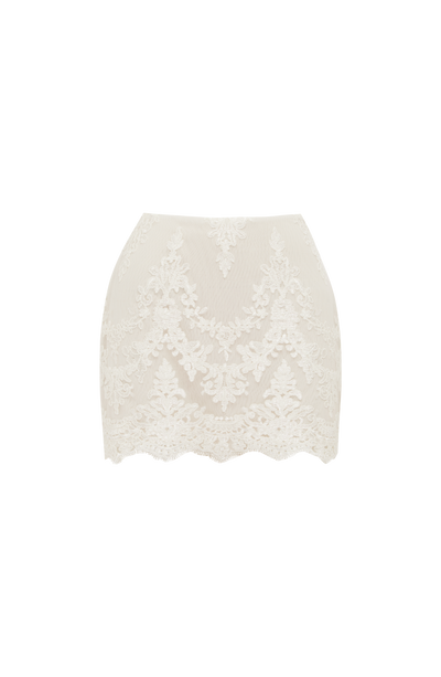Minifalda de encaje marfil con motivos florales y bajo festoneado