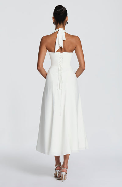 Vestido blanco midi con lazo en la espalda y escote halter en V profunda
