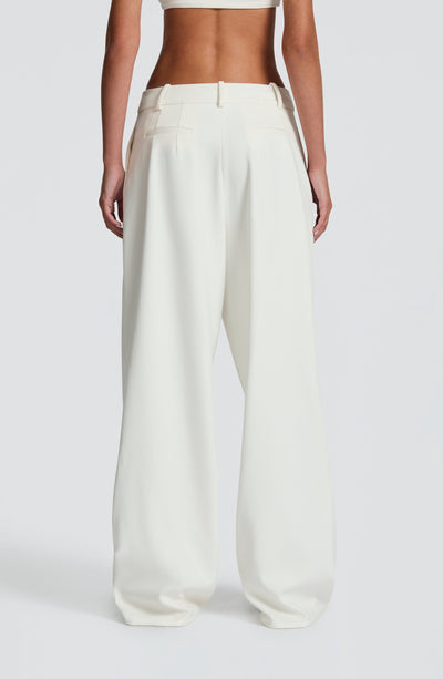 Pantalón marfil de tiro alto con elástico y bolsillos laterales